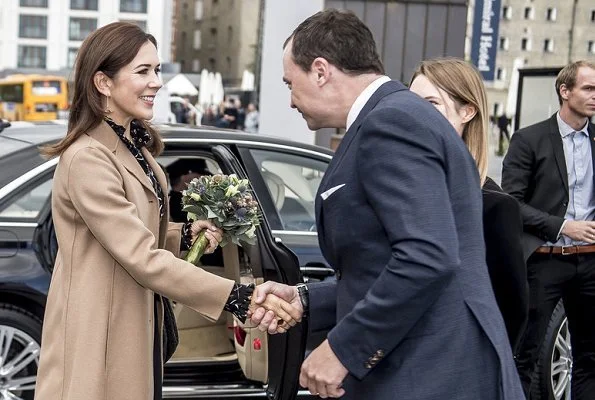 Crown Princess Mary wore Isabel Marant Sloan Leaf Print Silk Blouse, Gianvito Rossi pumps and she carried Bottega Veneta Veneta Maxi Hobo Bag