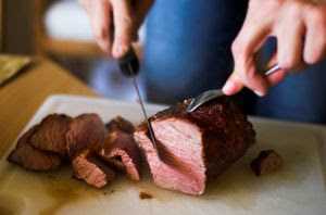 Image: The steak 2: A steak being cut up with a knife. Photo credit: Klaus Post (sh0dan), on FreeImages