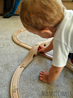 Tracing wooden train track numbers from And Next Comes L