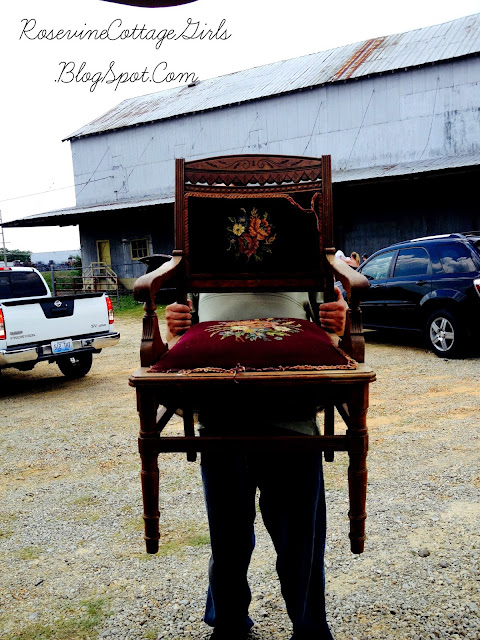 Mr Cottage carrying an antique chair from the 400 Mile Long Yard Sale, Southern Yard Sales, Super Yard Sales, Antique Yard Sales by Rosevine Cottage Girls