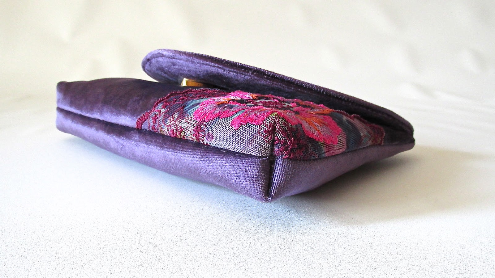 purple velvet clutch bag
