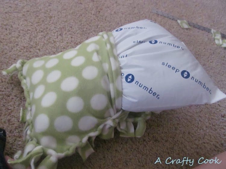 A Crafty Cook No Sew, No Knot Fringe Fleece Blanket and Pillow Cover