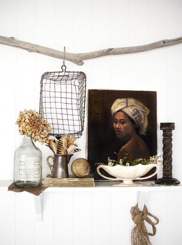 White shelf topped with vintage finds and neutral palette. Bohemian Chic Home Decor in a White Cottage by Kara Rosenlund. #rusticdecor #boho #shelf #decorating