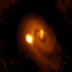 La nascita di un sistema stellare triplo colta in flagrante