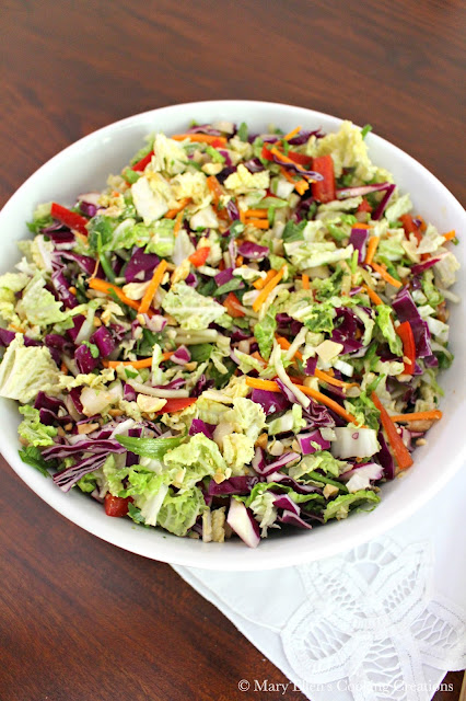 Colorful and crunchy veggies with peanuts and cilantro tossed with a peanut-lime dressing. A light and fresh Thai inspired salad. Asian Coleslaw