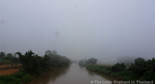 Crossing the Nan River at a foggy morning in Nan - Thailand Motorbike Riding in Thailand
