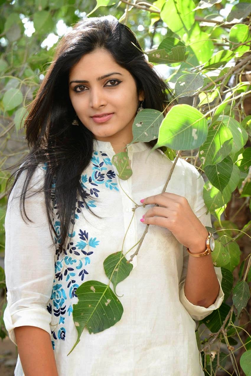 Actress Pavani Gangireddy Cute Images In White Dress Cap