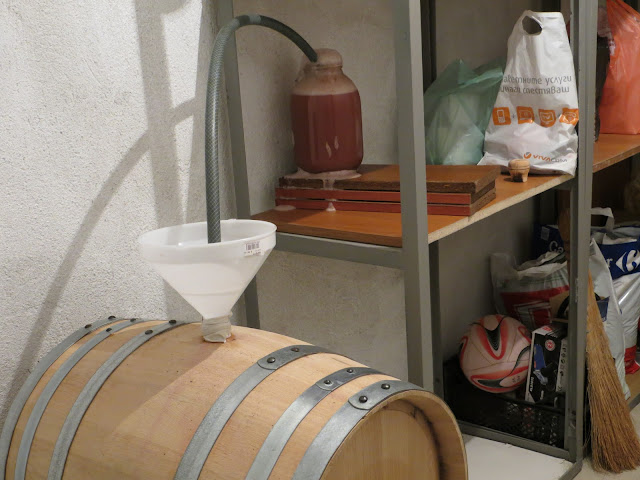 wooden-barrel-with-wine-in-a-cellar