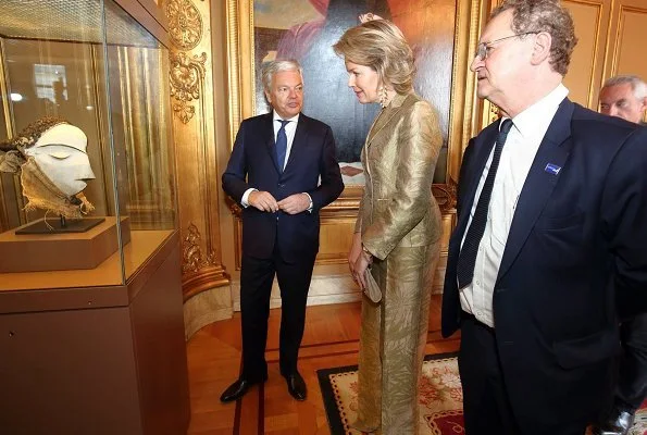 Queen Mathilde attended the official opening of Africa Museum exhibition at the Egmont Palace. Armani Collezioni floral jacquard blazer and pants