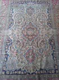 Worn Persian Carpet