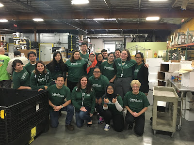Campus community help sort 6,000 pounds of food that will be distributed to families throughout the Peninsula