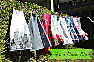 Hanging Aprons on a Clothesline Outside in the Sunshine and a Breeze aprons drying in the sun