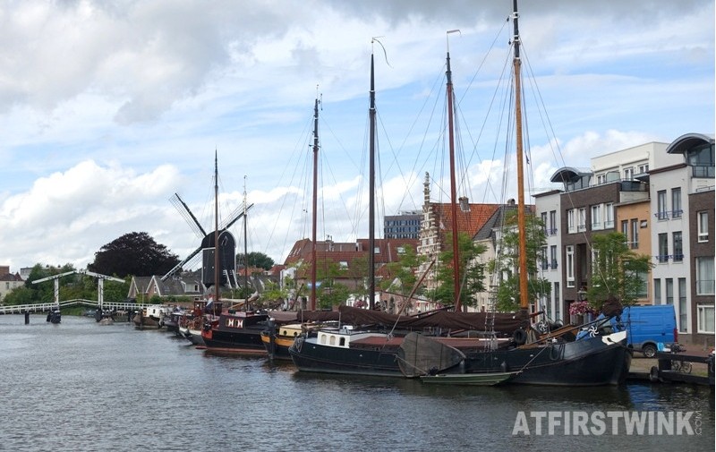 Molen de Put dutch windmill Leiden Netherlands bridge boats houses