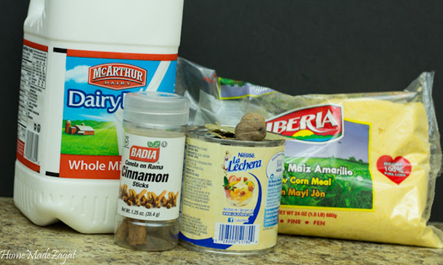 Ingredients to be used to make cornmeal porridge, standing on brown shelf