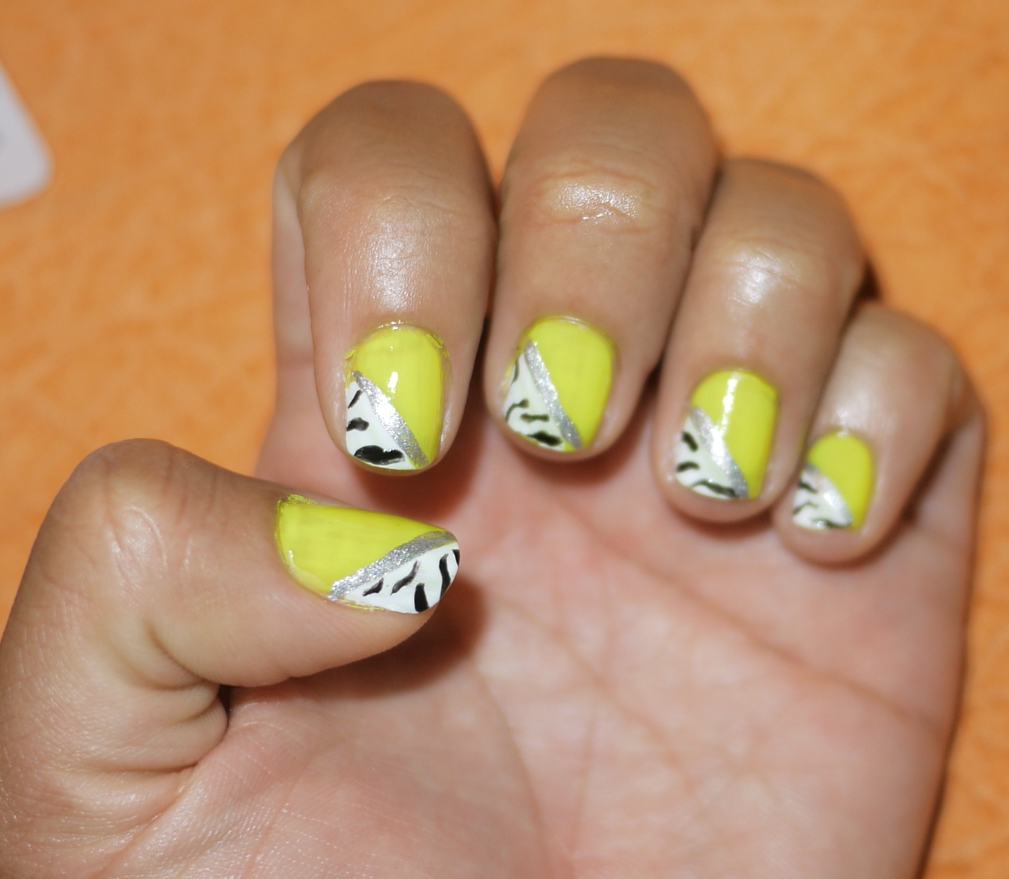 DIY Nails Step 4: Drew random black lines to give it an animal pattern ...