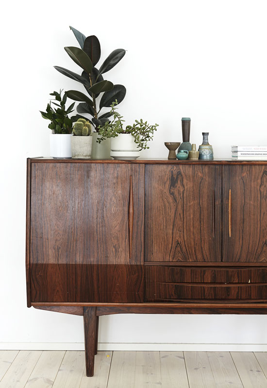 Fresh vignettes on the credenza in Weekday Carnival's home.