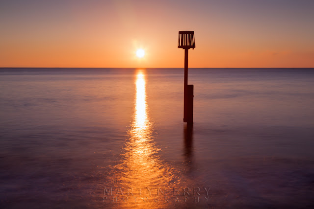 Image of the ocean at Swanage in Dorset at sunrise