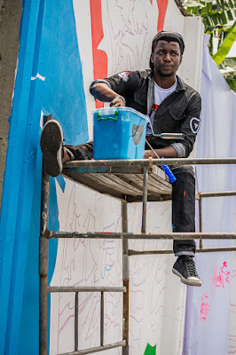 D1%2B%252858%2529 Lagos gets a new make over from Graffiti Artist, Osa Seven!