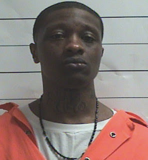 new orleans cop killer feces mouth head face