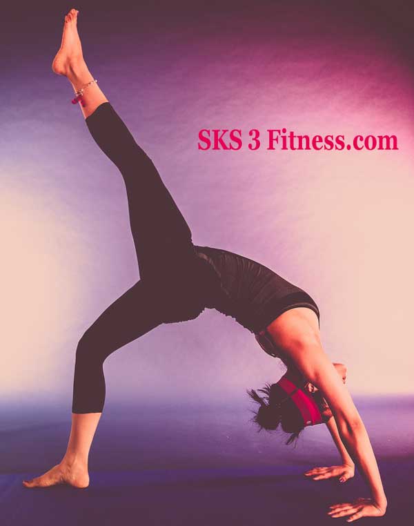 Yoga Girl doing Eka Pada Urdhva Dhanurasana or One Legged Wheel Pose
