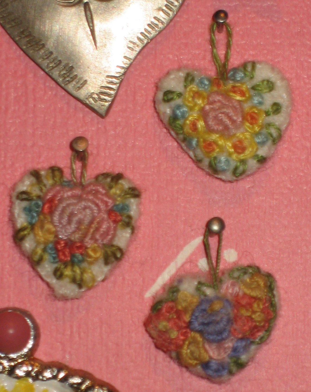 knotted hearts dangle charm