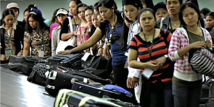  A group of Filipino overseas workers at an airport with the text 'Documents for Filipino overseas workers' superimposed.