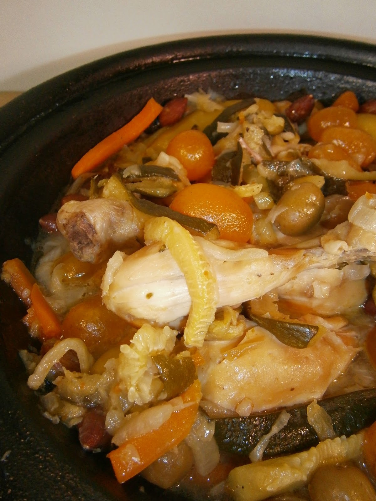 Délices d'une novice Tajine de poulet aux kumquats confits, pommes de terre, courgette