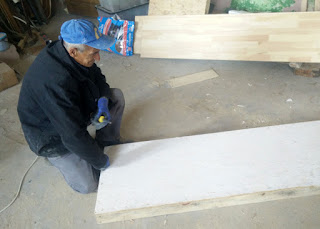 Sally taking apart the door he made for the vestibule last year Sally taking apart the door he made for the vestibule last year