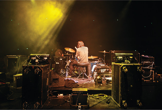 Drummer on stage guitar center professional, live sound, microphones, gc pro