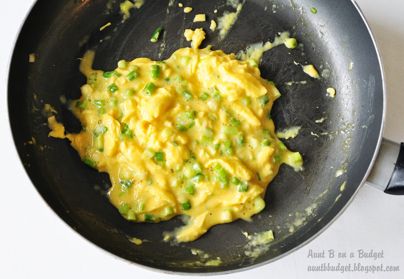 BethAnne on a Budget Scrambled Eggs With Green Onions On Bacon Cheddar