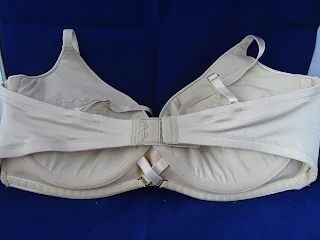 the back view of up bra including cross over details for moving cups 