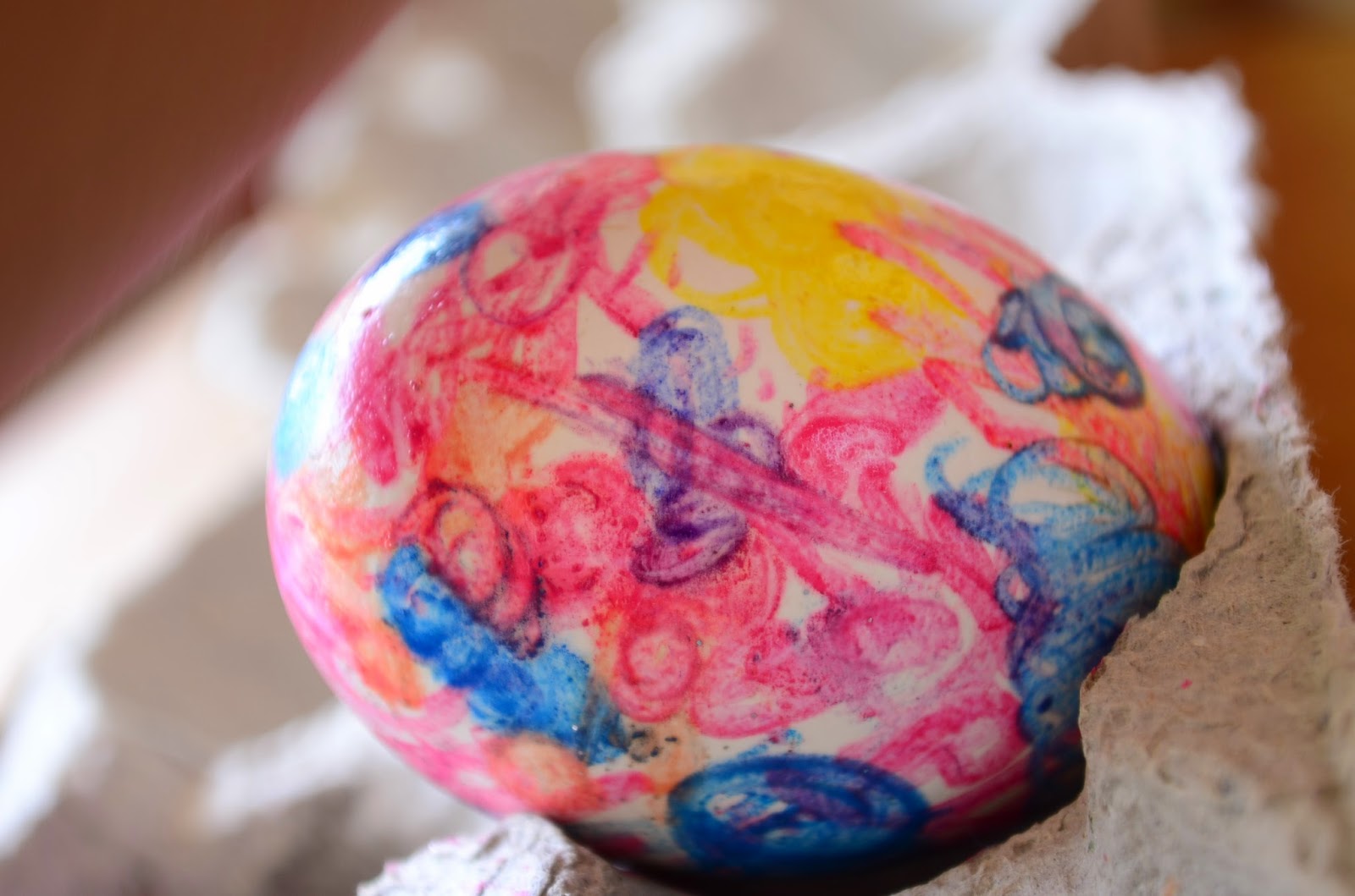 Decorate Easter Eggs with pink, purple, yellow, and blue
