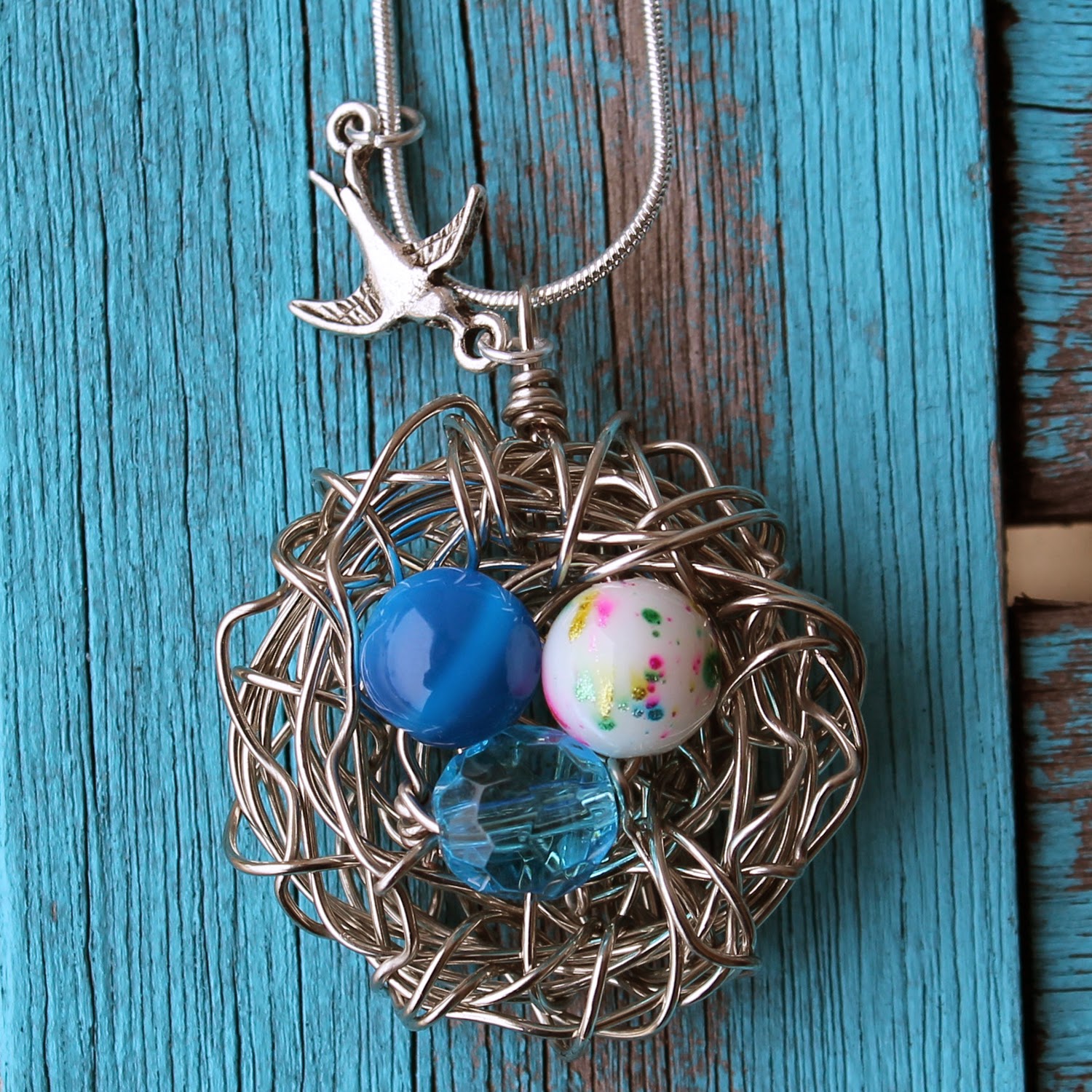 http://www.doodlecraftblog.com/2015/02/bird-nest-wire-wrapped-necklace.html