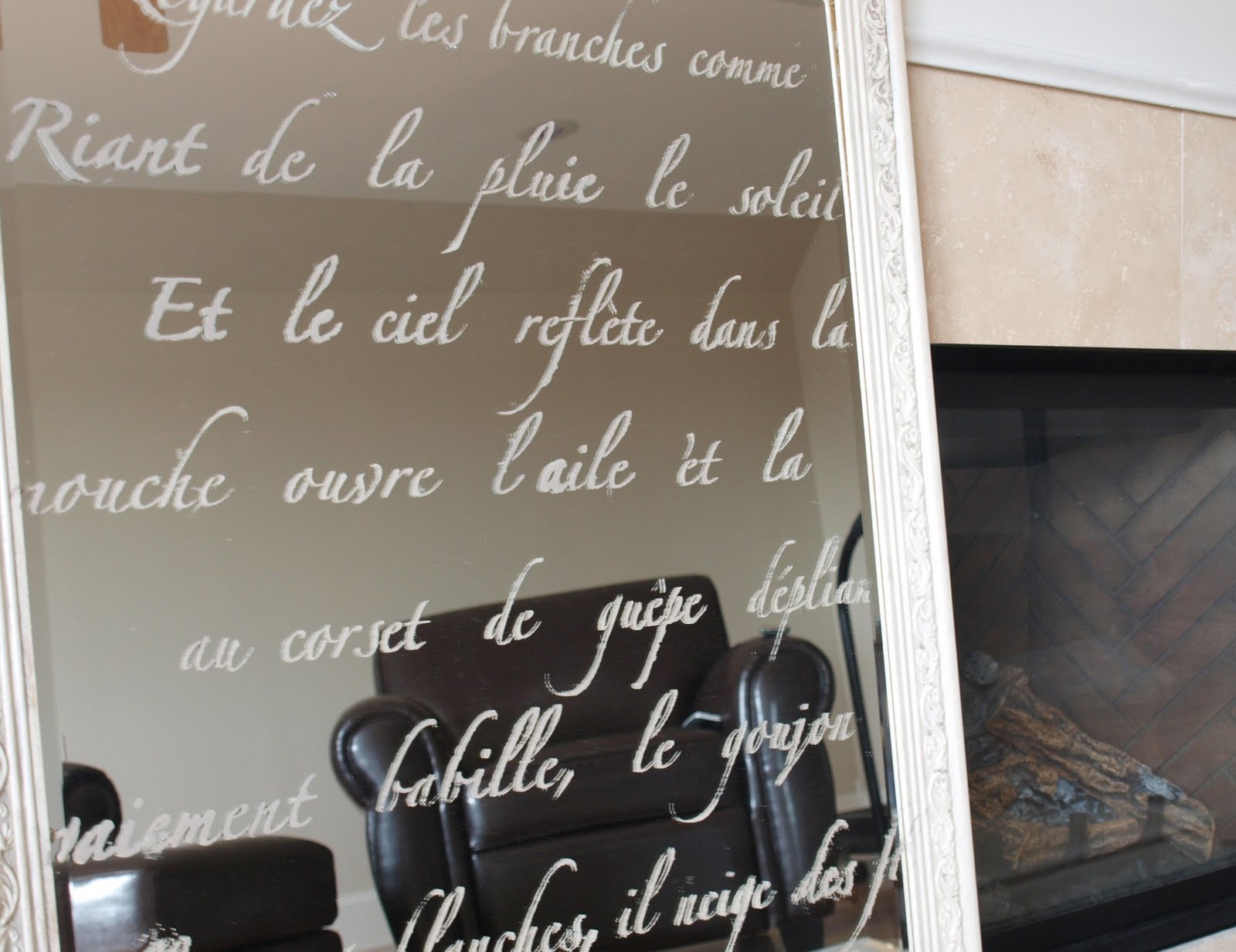 French poem stencil (Springtime in Paris) on a mirror for an etched French country mirror look! Hello Lovely Studio.