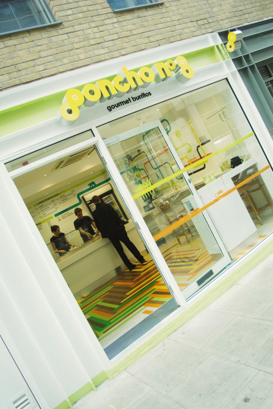 Poncho no 8 is a mexican food restaurant popular for its burritos it is located in a busy london street and is done by the native london design studio