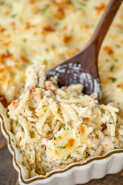 Million Dollar Chicken Alfredo - seriously delicious! Chicken, pasta, alfredo sauce and 4 cheeses! The BEST chicken alfredo EVER!!! Can make ahead and refrigerate or freeze for later. Spaghetti, cream cheese, sour cream, cottage cheese, chicken, Alfredo sauce, parmesan cheese and mozzarella cheese. Serve with a simple salad and garlic bread. Great for dinner parties and potlucks! Everyone loves this easy casserole! I never have any leftovers!! #casserole #chickencasserole #pasta #freezermeal Million Dollar Chicken Alfredo - seriously delicious! Chicken, pasta, alfredo sauce and 4 cheeses! The BEST chicken alfredo EVER!!! Can make ahead and refrigerate or freeze for later. Spaghetti, cream cheese, sour cream, cottage cheese, chicken, Alfredo sauce, parmesan cheese and mozzarella cheese. Serve with a simple salad and garlic bread. Great for dinner parties and potlucks! Everyone loves this easy casserole! I never have any leftovers!! #casserole #chickencasserole #pasta #freezermeal