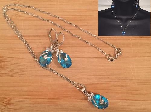 925 Silver and Floral Blue Dazzle Oval Crystal Stone Necklace and Earring Set - Visuals - Ref-2215