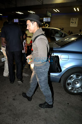 Aamir Khan leaves for US in his 'Dhoom 3' look