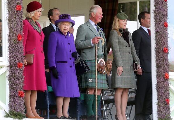Queen Elizabeth, The Prince of Wales and Duchess of Cornwall, Autumn Phillips and Peter Phillips. Camilla wore a red wool coat by Burberry