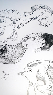 Close up photo of Kostas Gogas' drawing, entitled 'Abstract Fish', depicting fish-like shapes made with pencil. Click to enlarge.