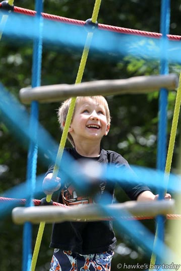 Alec Stanton-Croom, 4, Clive, on a climbing frame at the Lions' Community Park in Sylvan Rd, Hastings, in pleasantly hot sunny weather. Alec Stanton-Croom, 4, Clive, on a climbing frame at the Lions' Community Park in Sylvan Rd, Hastings, in pleasantly hot sunny weather. photograph