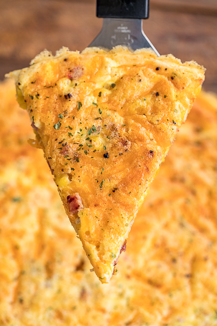 Ham & Corn Pie - crazy delicious! Crustless quiche loaded with ham, corn and cheese. Ready to bake in minutes! Ham, corn, cheddar cheese, eggs, Bisquick and milk. Great for breakfast, lunch or dinner. The whole family loved this easy recipe! #quiche #ham #cheese #kidfriendlyrecipe #dinnerrecipe Ham & Corn Pie - crazy delicious! Crustless quiche loaded with ham, corn and cheese. Ready to bake in minutes! Ham, corn, cheddar cheese, eggs, Bisquick and milk. Great for breakfast, lunch or dinner. The whole family loved this easy recipe! #quiche #ham #cheese #kidfriendlyrecipe #dinnerrecipe