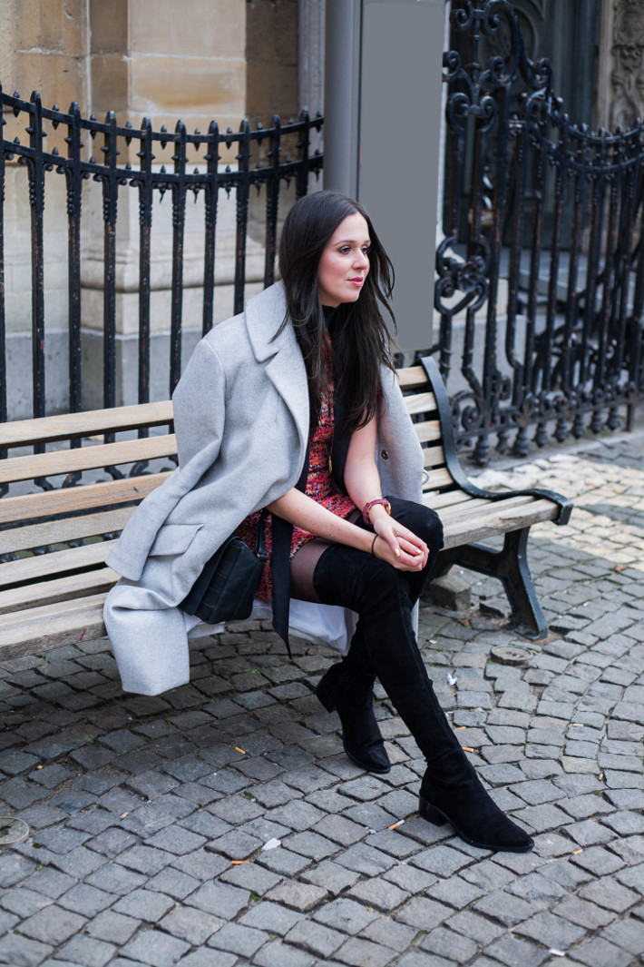 black sweater dress with thigh high boots