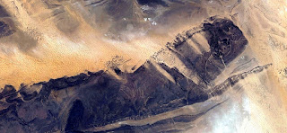 abstract surrealism, photographs deserts of Africa from the air, mirage in the desert, giant insect, fossilized lobster, collection of Abstract Naturalism Munimara abstract surrealism, photographs deserts of Africa from the air,