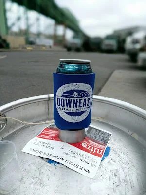 Downeast Cider koozie on a keg in Boston