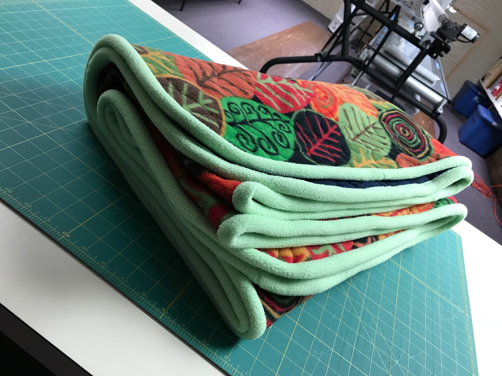Quilting In The BunkHouse Fleece Stadium Blanket