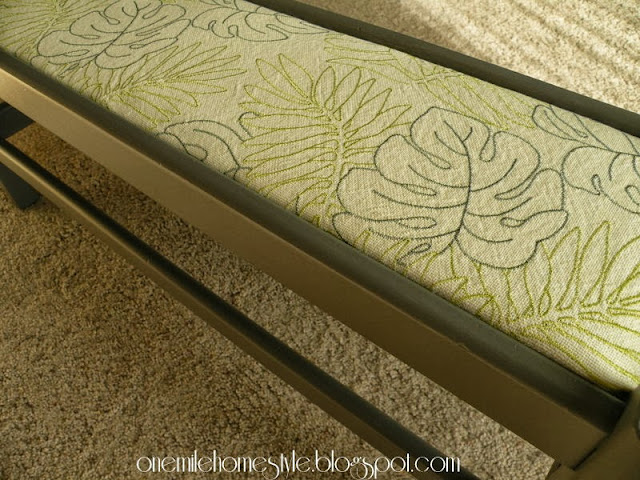 Gray bench with leaf fabric insert