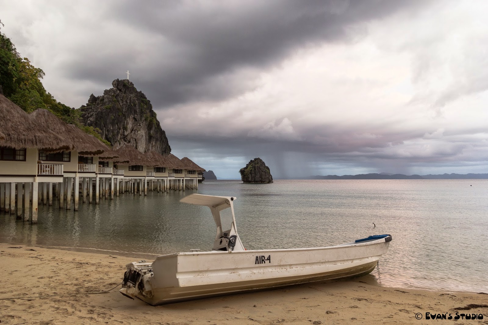   A storm is brewing beyond the Air4 boat at Apulit Island Resort, in the Philippines.