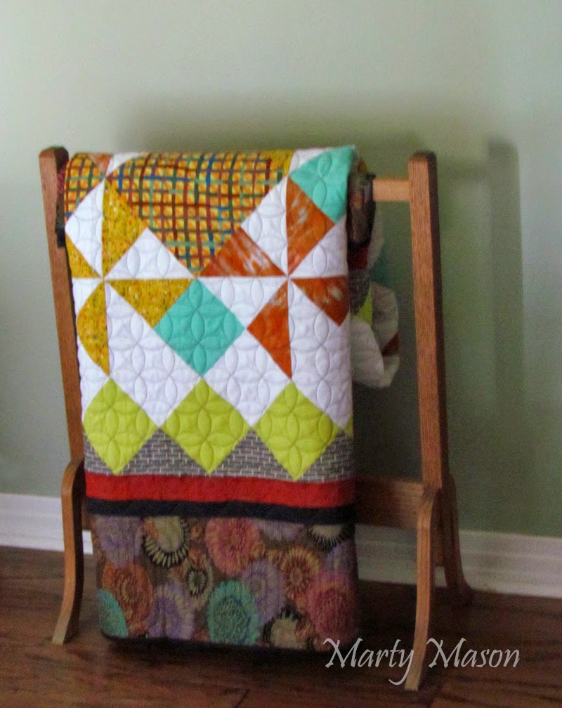a square quilt by Marty Mason:  "It's hip to be square"