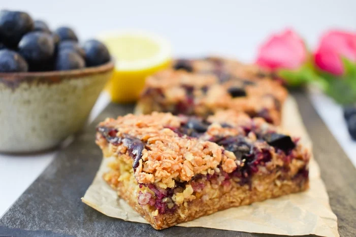 Close up of blueberry and lemon oaty breakfast bars